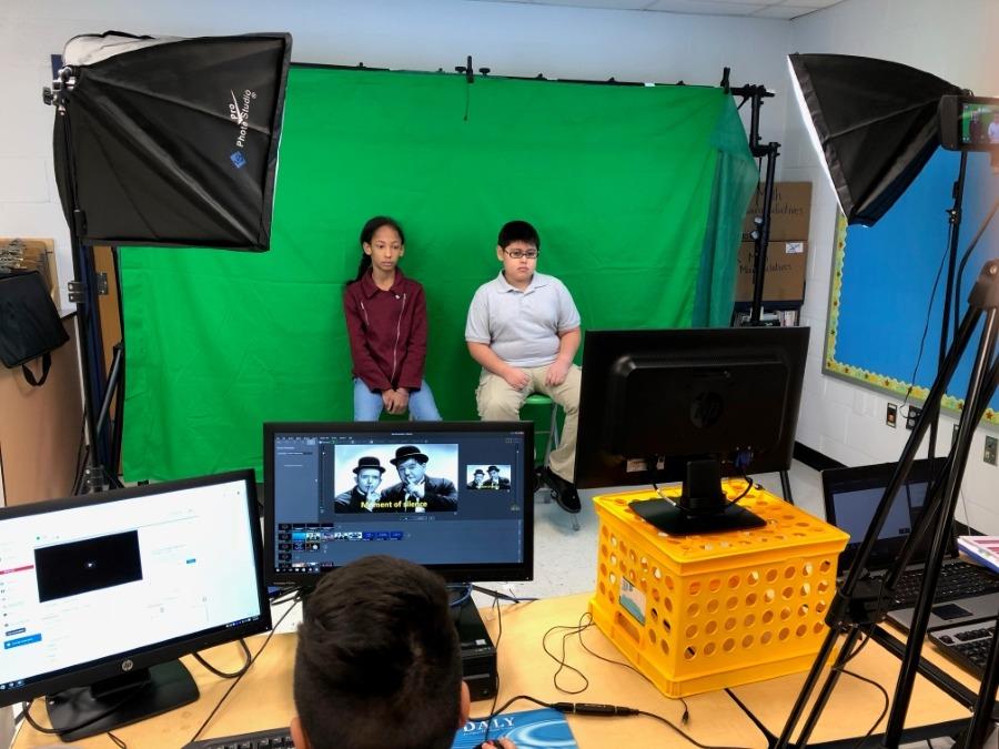 Kyla and Angel doing the Morning Announcements Kyla and Angel doing the Morning Announcements